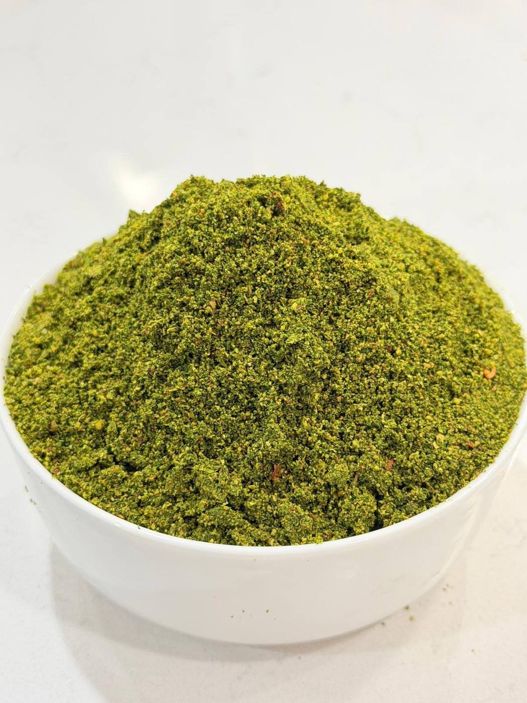 Moringa powder in a bowl